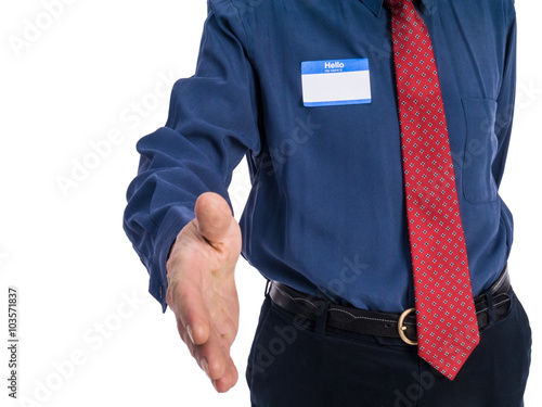 Photo of senior man in a blue shirt and red tie wearing a 