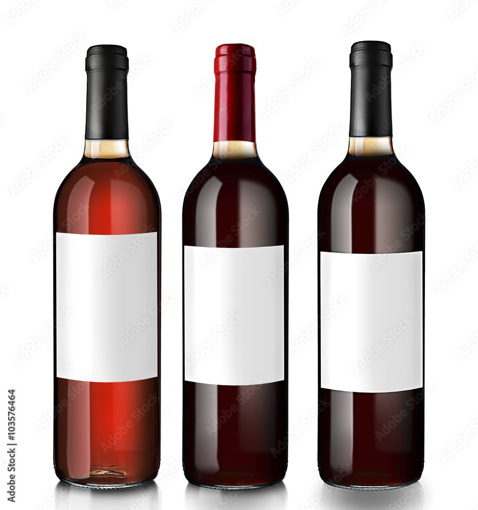Bottles of red wine with empty labels, isolated on white Bottles of red wine with empty labels, isolated on white