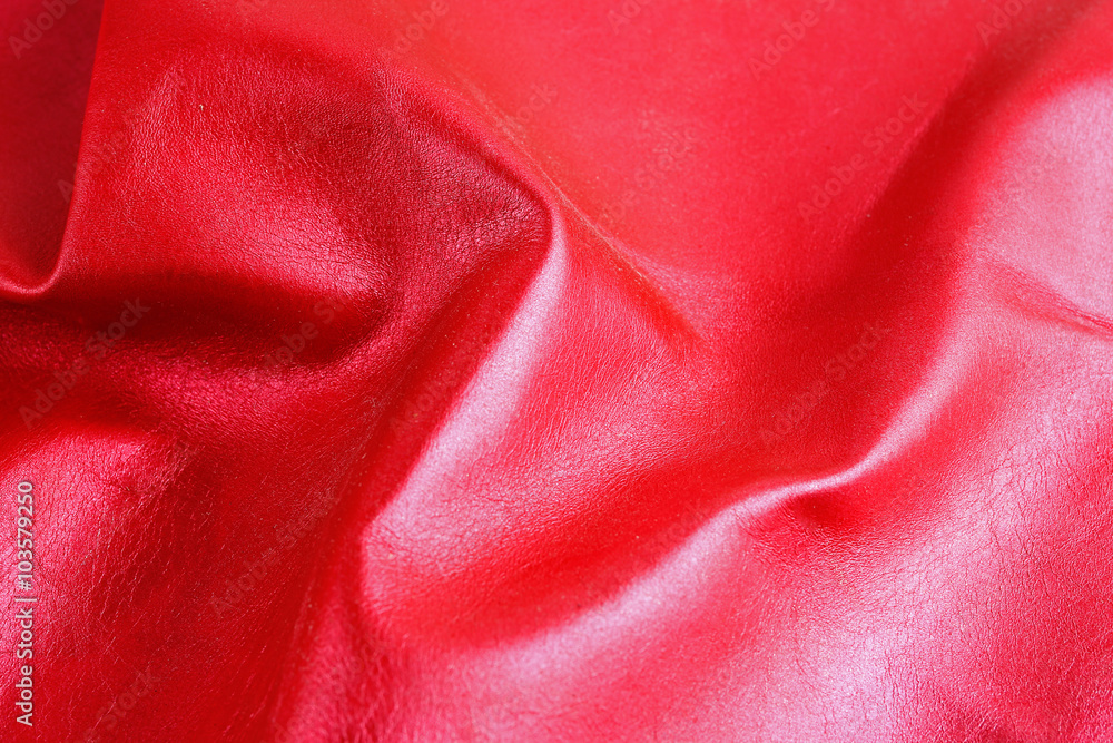 Red shiny leather texture close up Red shiny leather texture close up
