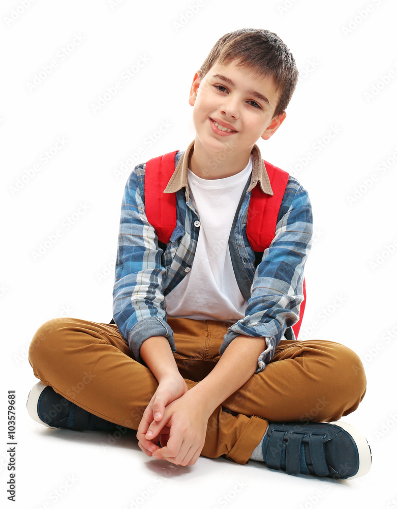 Cute little boy with red backpack, isolated on white Cute little boy with red backpack, isolated on white