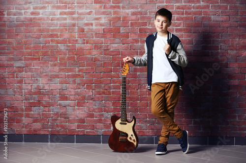 Cute little boy with guitar...