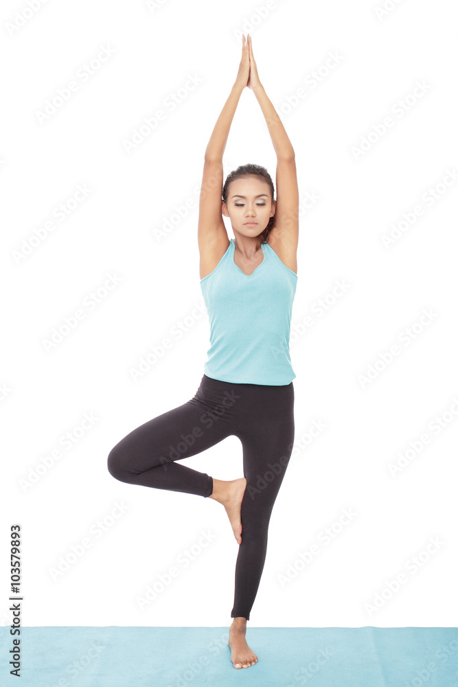 young woman practicing yoga