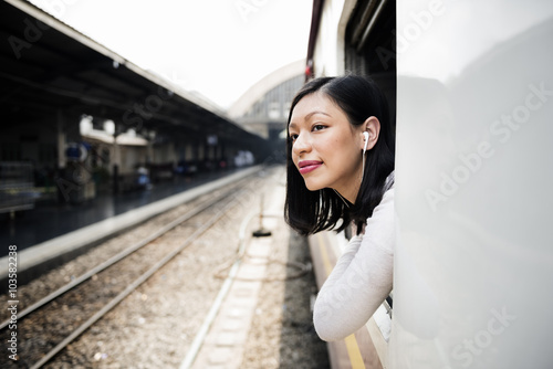 Asian Lady Traveling Commute Train Concept