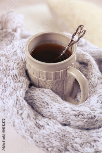 Cup of hot drink in living room. Comfortable winter weekend or holidays at home