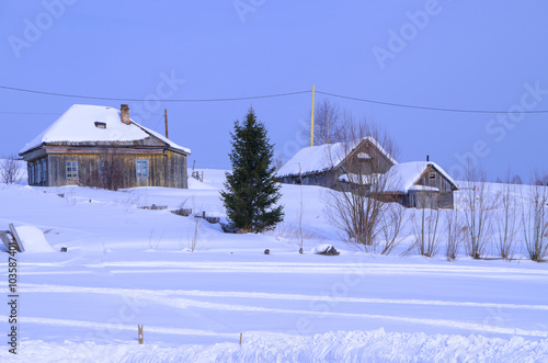 Landscape of the Russian village of the house in the winter   © rosetata