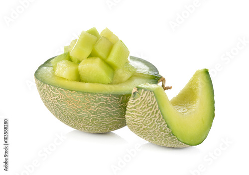 half and portion cut ripe honeydew melon on white background