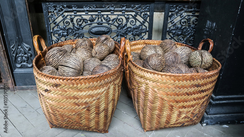 dry Cerbera oddloam's seed with basket ( Pong-pong, Othalanga, s photo