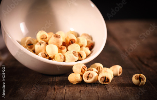 A group of dried lotus seeds photo