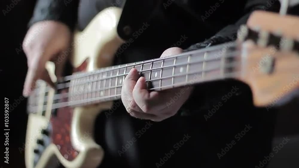 Close up video of bass guitar playing Close up video of bass guitar playing