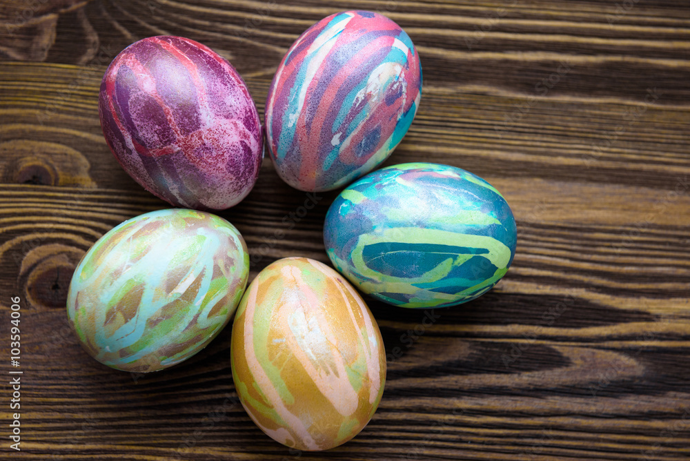 Obraz premium Easter eggs on wooden background