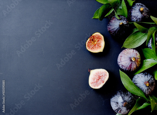 figs with leaves on a black, selective focus