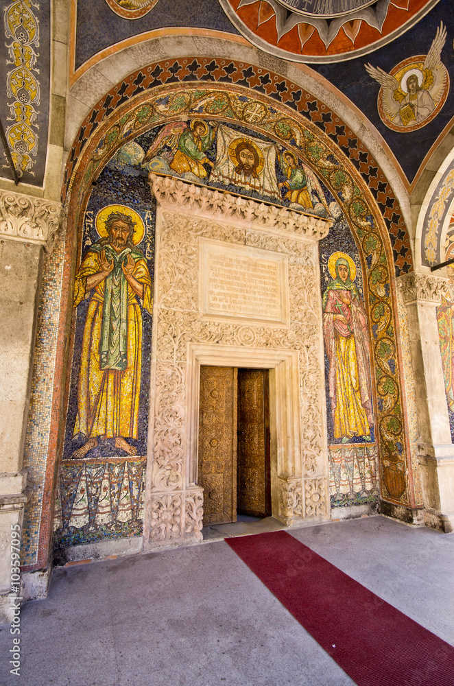 Decorated door of church in Bucharest, Romania