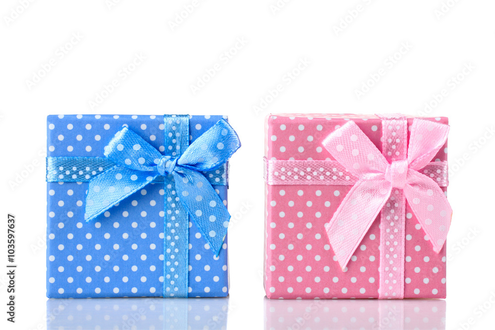 pink and blue closed boxes with bows a gift on white isolated background pink and blue closed boxes with bows a gift on white isolated background