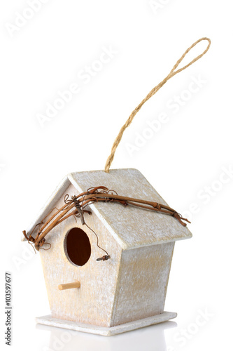 Fényképezés beautiful little wooden birdhouse with twig isolated on white background