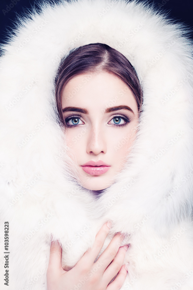 Pretty Female Face in White Fur. Young Woman Fashion Model Pretty Female Face in White Fur. Young Woman Fashion Model