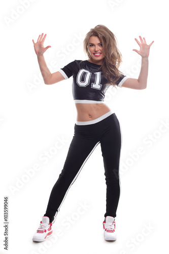 Young woman in sport wear isolated on white background