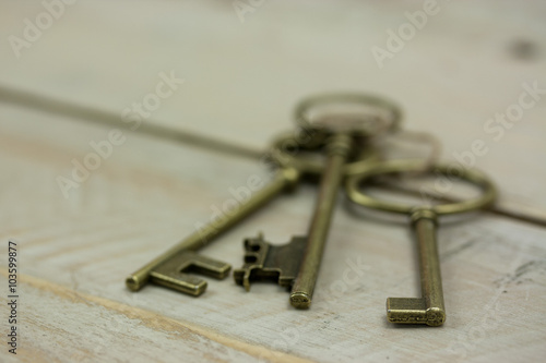 Old keys on a rustic background © Christopher Hall