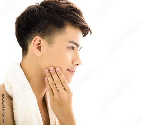 Closeup portrait of attractive young man face