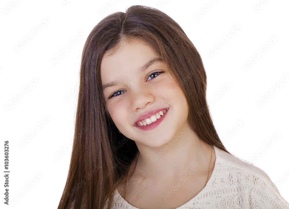 Portrait of a charming little girl smiling at camera Portrait of a charming little girl smiling at camera