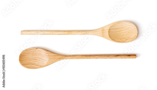 Two wooden spoons on the white background