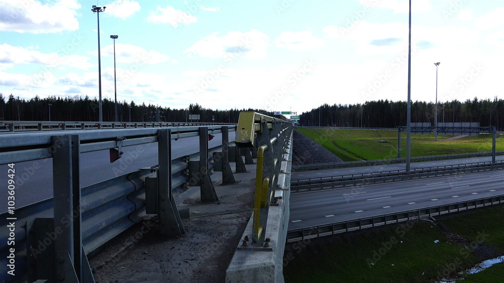 Russia, Peterhof, May 03, 2015 - the movement of freight and passenger transport on a viaduct and Beltway Russia, Peterhof, May 03, 2015 - the movement of freight and passenger transport on a viaduct and Beltway