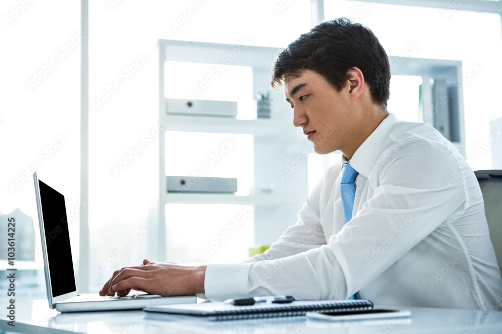 Busy asian business working on laptop Busy asian business working on laptop