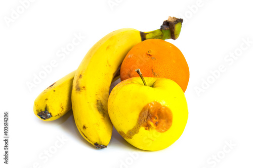 Rotten fruits bananas orange Apple isolated on white