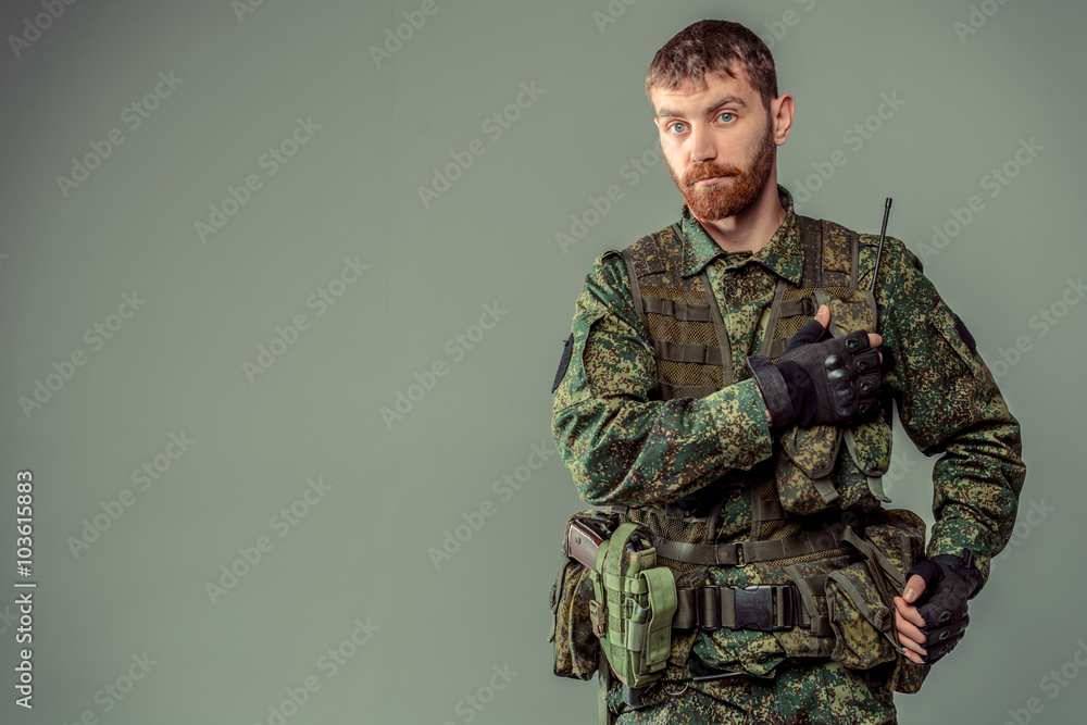 Special forces soldier with rifle on dark background
Special forces soldier with rifle on dark background