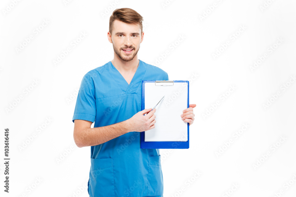 Happy male doctor showing blank clipboard Happy male doctor showing blank clipboard