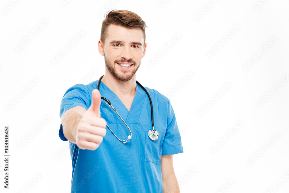 Happy male doctor showing thumb up Happy male doctor showing thumb up