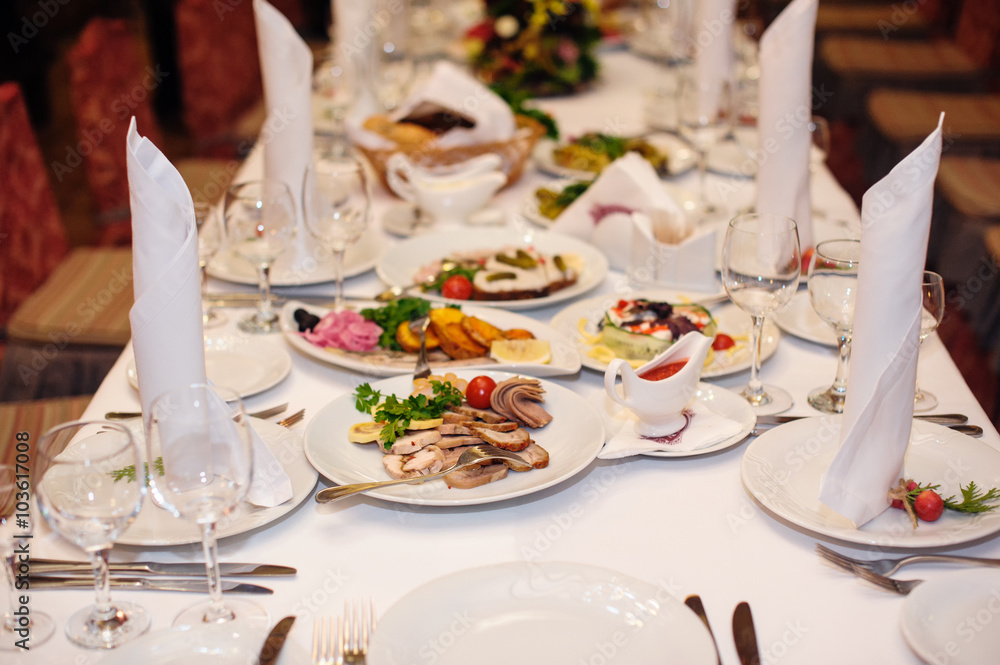 decorated table for a wedding dinner in the restaurant