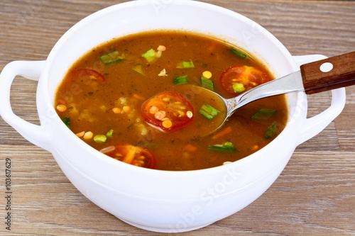 Spicy soup with curry, chili, cereals, rice and vegetables.
