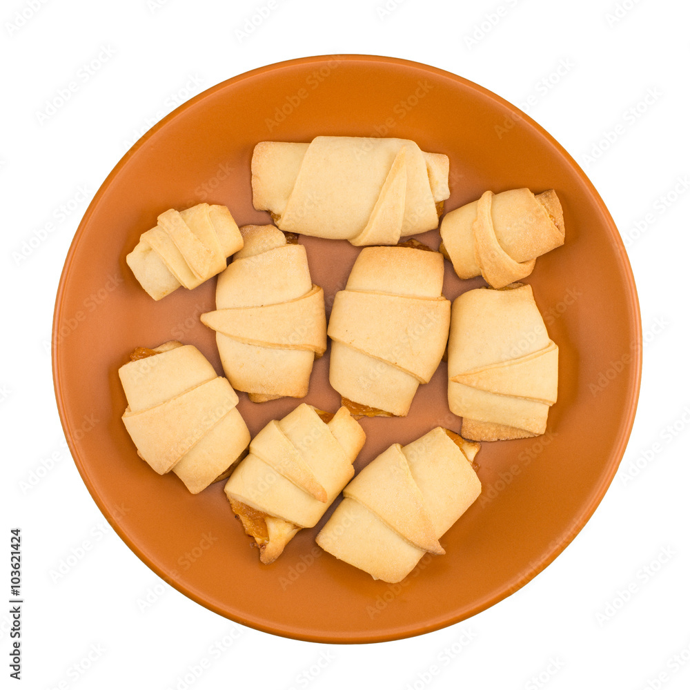 The plate of hand made cookies with jam, isolated on white backg The plate of hand made cookies with jam, isolated on white backg