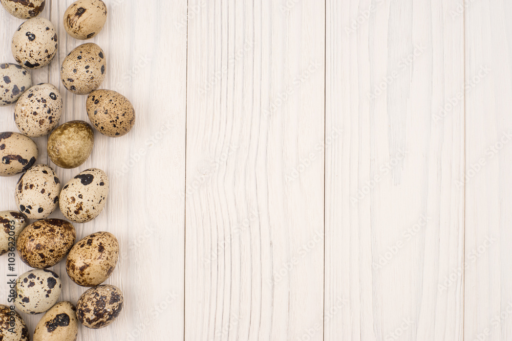 Quail eggs on wooden table top view Quail eggs on wooden table top view