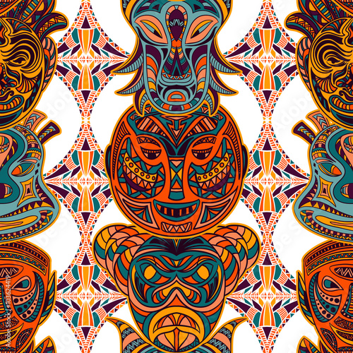 Seamless pattern with tribal mask and aztec geometric latin American ornament. Colorful hand drawn vector illustration