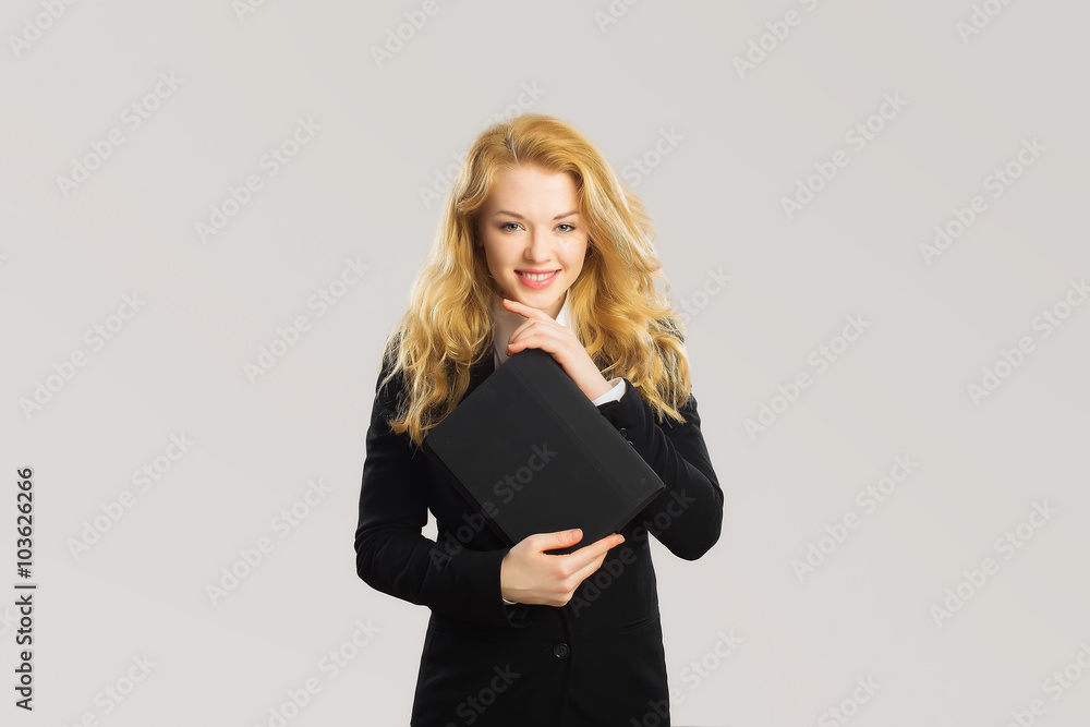 Business woman looking at tablet in front of him and smiles. Iso Business woman looking at tablet in front of him and smiles. Iso