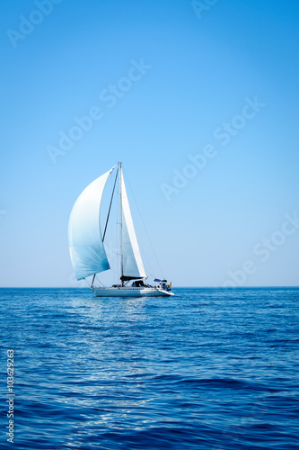 Sailing. Ship yachts with sails in the open Sea. 1