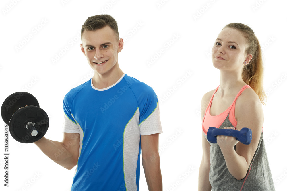Teenagers working out with dumbbells Teenagers working out with dumbbells