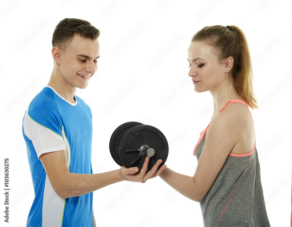 Teenagers working out with dumbbells