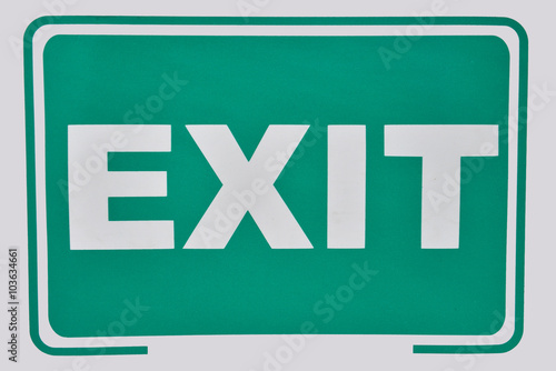 Close up of a exit sign for stairway. Green emergency exit sign.