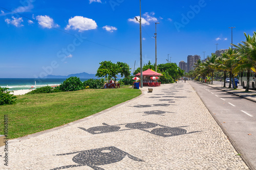 Barra da Tijuca beach with mosaic of sidewalk  in Rio de Janeiro. Brazil