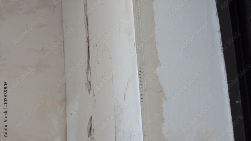 Applying Plaster/make repairs to the plaster room wall plaster Applying Plaster/make repairs to the plaster room wall plaster