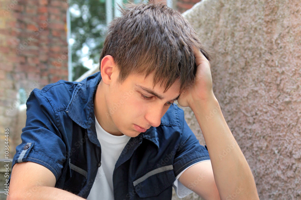 Obraz premium Sad Teenager outdoor