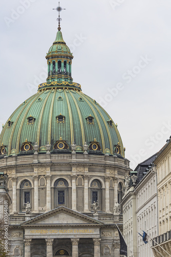 COPENHAGEN, DENMARK -SEPTEMBER 8: Castle Amalienborg with statue photo