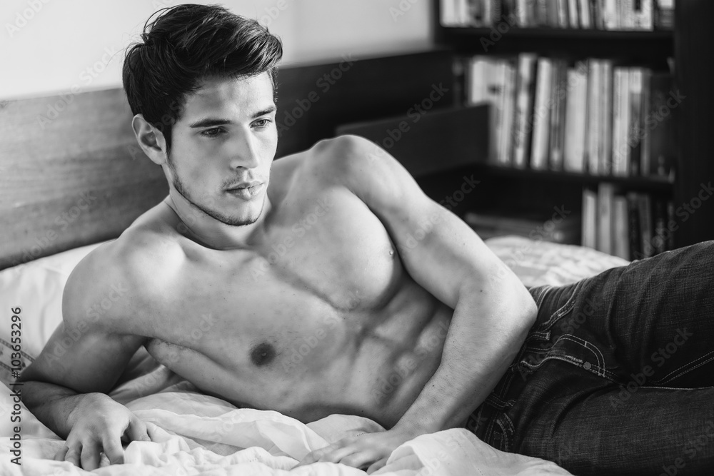 Shirtless Sexy Male Model Lying Alone On His Bed Stock Photo Adobe Stock