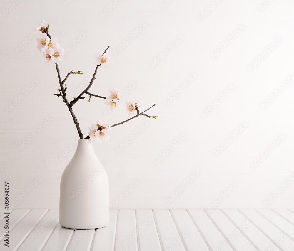 Fototapeta premium Vase with cherry blossom