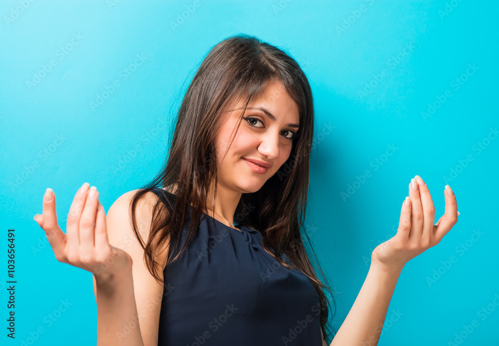 Fototapeta premium Beautiful young woman making the gesture Come