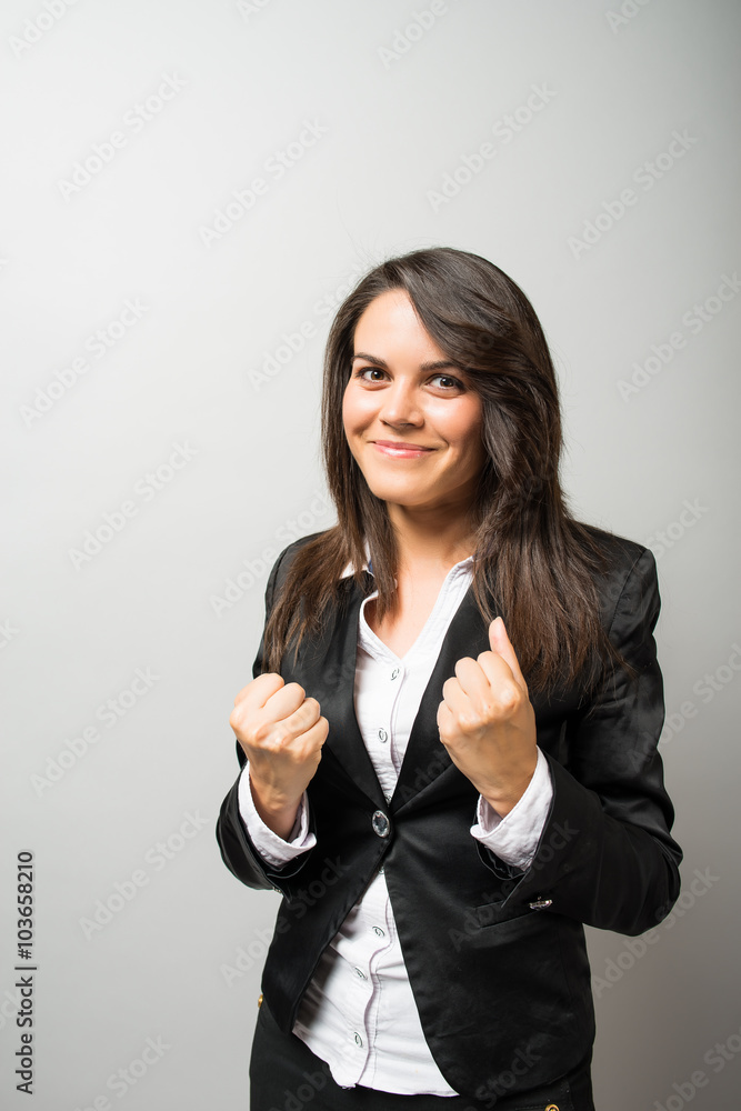beautiful business woman holds fists beautiful business woman holds fists