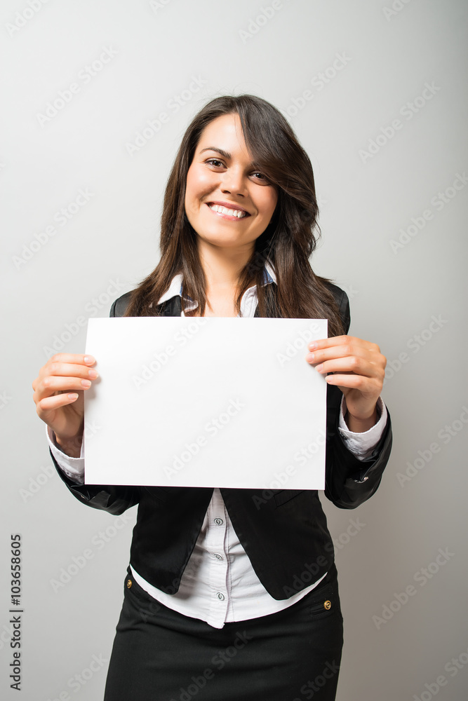 Business woman with a blank sheet of paper Business woman with a blank sheet of paper