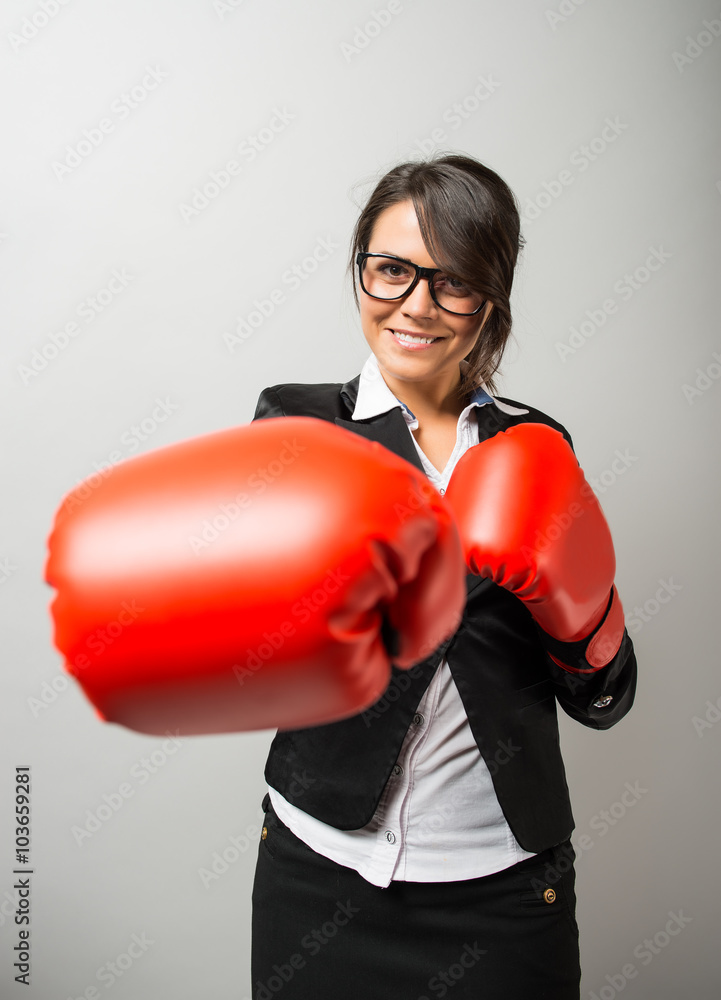 business woman with boxing gloves business woman with boxing gloves